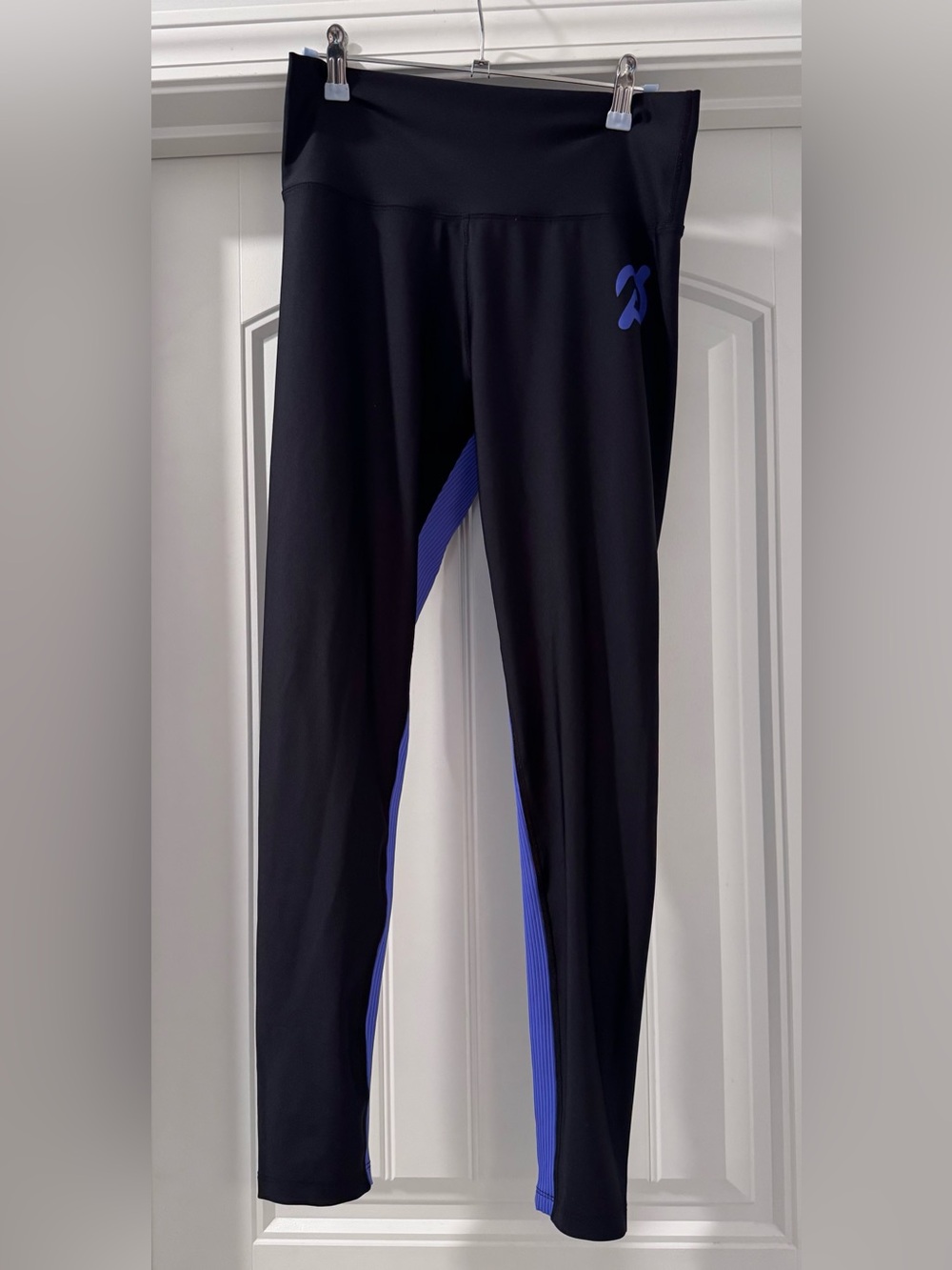 Peloton Black Leggings with Purple Inner Leg Panels